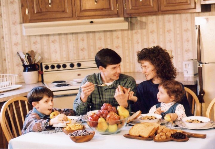 A family eating a nutritious breakfast before leaving home
